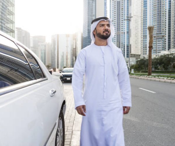 Arabic businessman in Dubai wearing Kandora – VIP private chauffeur service available 24/7